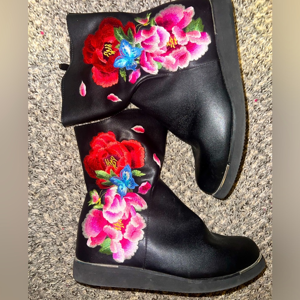 Black floral embroidered boots.